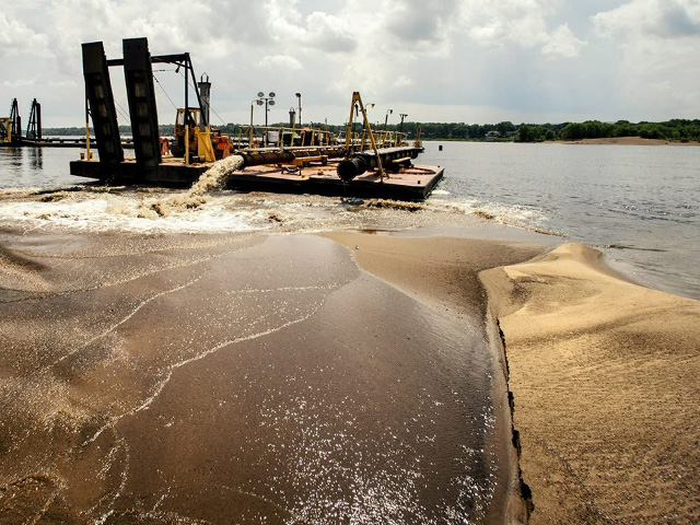The Dredge Goetz works on the Mississippi River earlier this year. The U.S. Army Corps of Engineers Rock Island District is running out of funds to keep the Dredge Goetz running full time in order to keep river transportation safe for barge traffic. (Photo by Brian Krause, courtesy of the Mississippi Valley USACE)